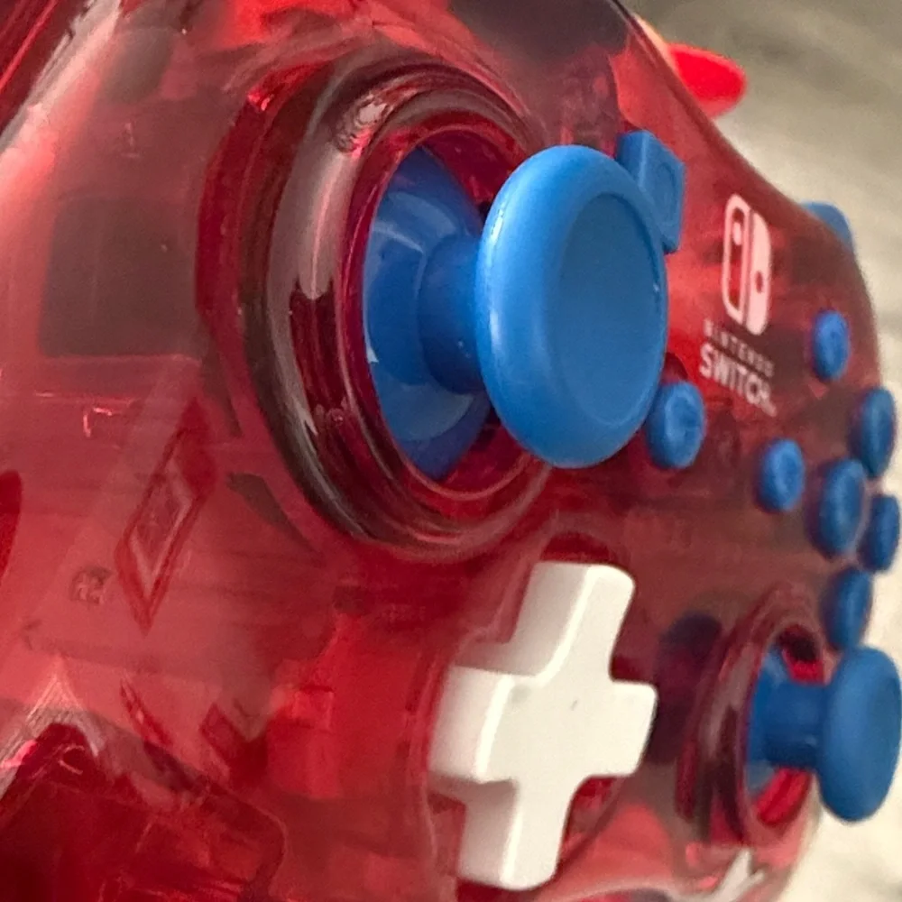 Nintendo Switch Red and Blue Controller with Mario Graphic